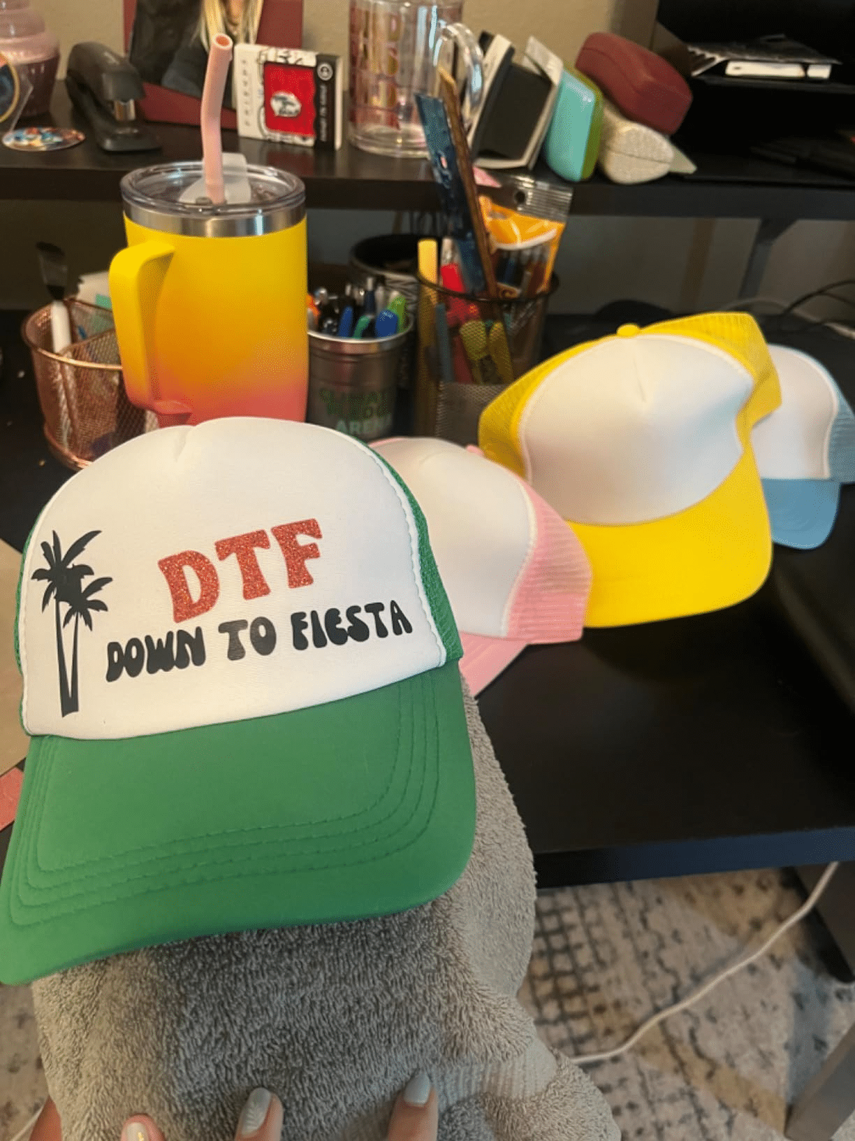 Green-white custom printed foam trucker hat with DTF transfer logo; mesh back cap for event merch and party giveaways.